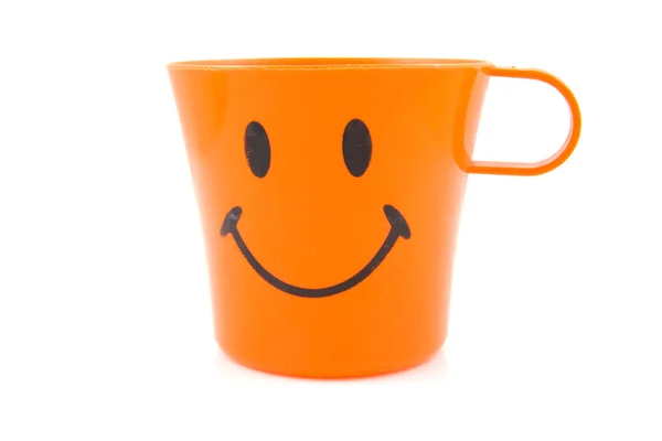 Смешная оранжевая чашка — стоковое фото