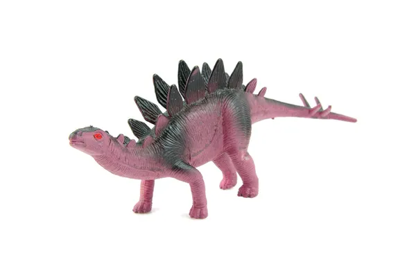 Фіолетова пластикова іграшка динозавра — стокове фото