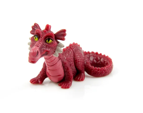 Brinquedo de dragão plástico roxo — Fotografia de Stock