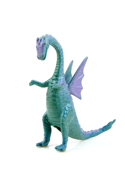 Фіолетова зелена пластикова іграшка дракона — стокове фото