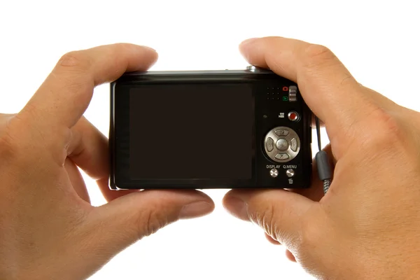 Руки с цифровой фотокамерой — стоковое фото