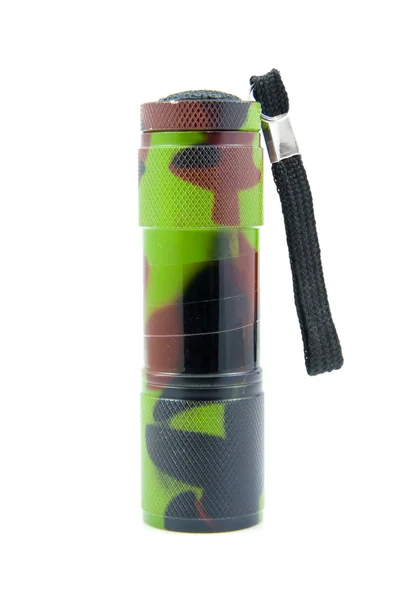 Flashlight in army outfit — Stock Photo, Image