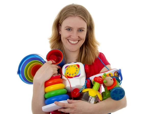 Woman with lots of toys — Stock Photo, Image