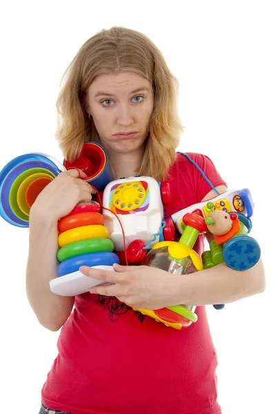 Donna con un sacco di giocattoli — Foto Stock