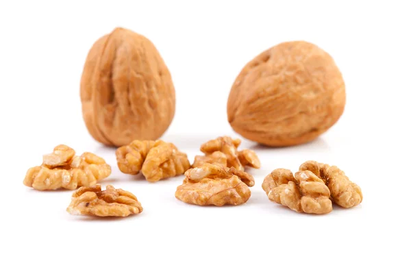 Pieces and whole walnut — Stock Photo, Image