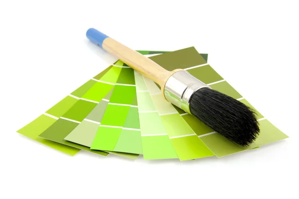 stock image Green color samples and paint brush