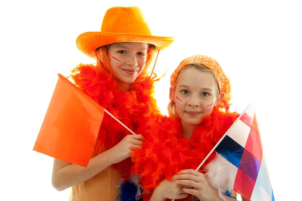 Two girls posing in orange outfit — Stock Photo, Image