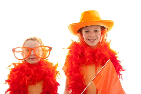 Two girls posing in orange outfit — Stock Photo, Image