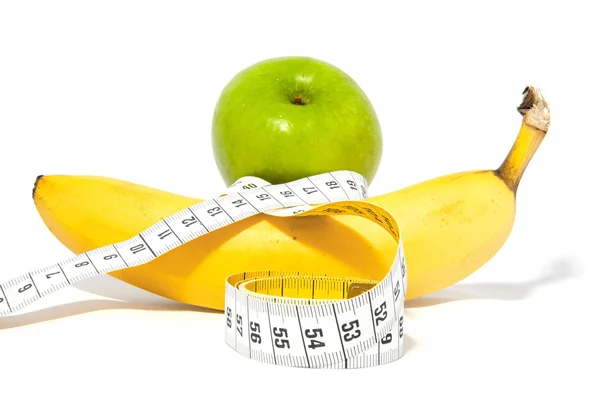 Apple and banana with measure tape — Stock Photo, Image