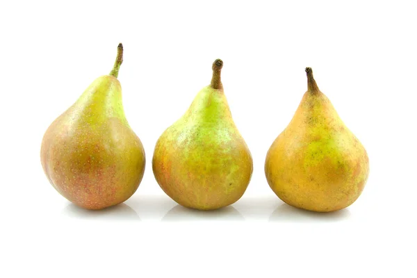 Tre päron i rad — Stockfoto