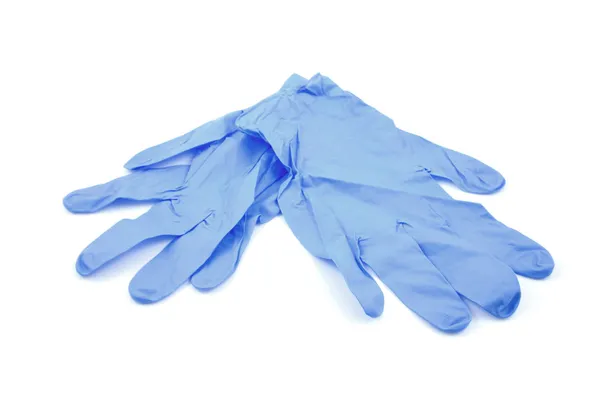 Синие медицинские перчатки — стоковое фото