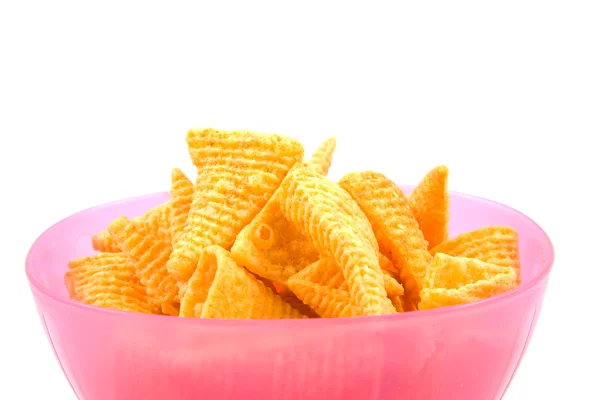 Pink bowl filled with potato chips — Stock Photo, Image