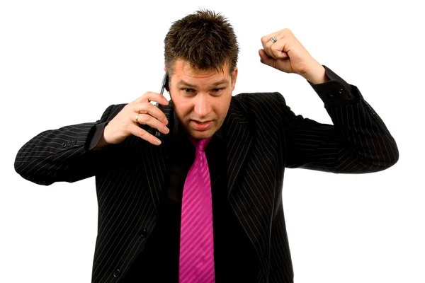 Angry businessman is calling on the phone — Stock Photo, Image