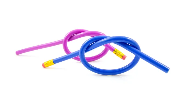 Blue and purple knotted pencils — Stock Photo, Image