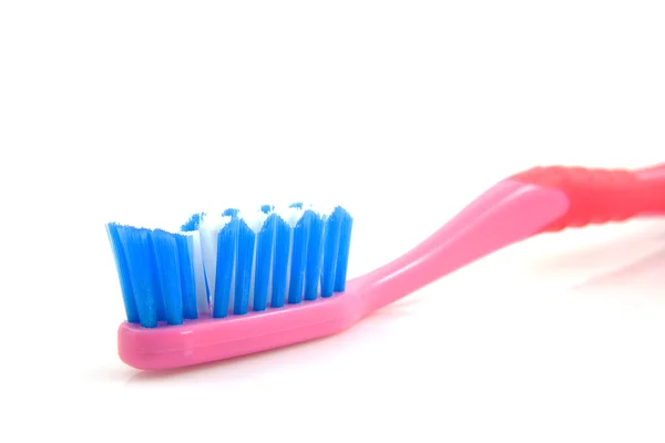 Рожевий зубна щітка — стокове фото