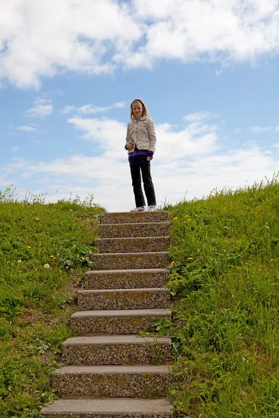 Girl on top of a stairs — Stock Photo, Image