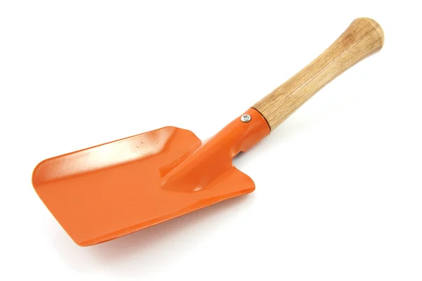 Садовый инструмент; оранжевая лопата — стоковое фото