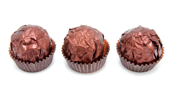 Tres bombones de chocolate —  Fotos de Stock