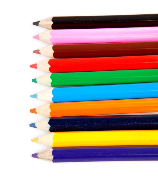 Lápis coloridos em uma linha — Fotografia de Stock