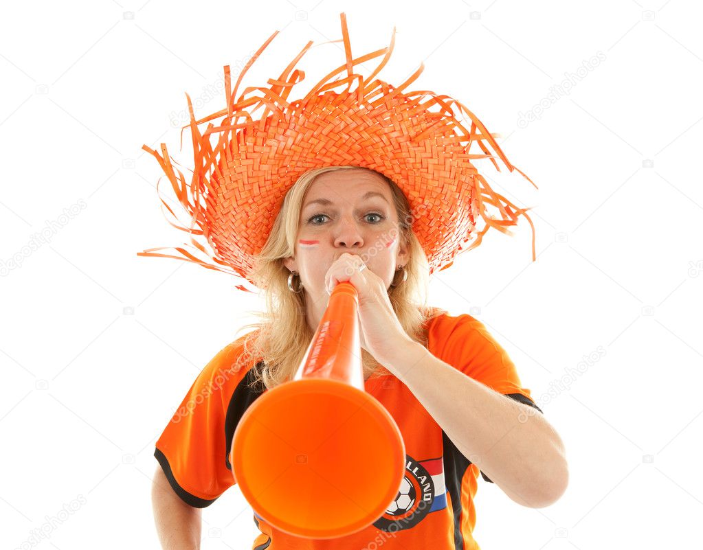 Dutch soccer supporter with orange vuvuzela