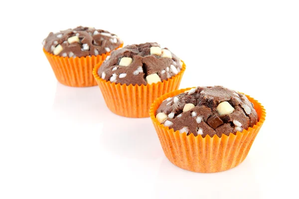 Three brown homebaked cupcake — Stock Photo, Image