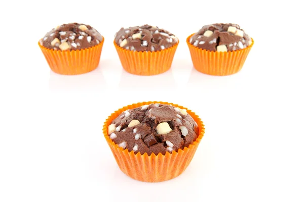 Vier bruin zelfgebakken cupcake — Stockfoto