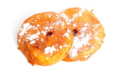 Two home baked appelflappen ( apple fritter) clipart