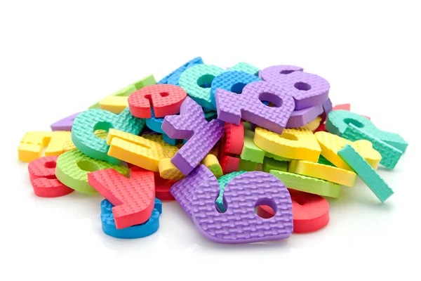Pilha de letras de espuma coloridas — Fotografia de Stock