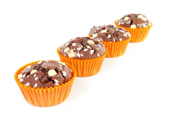 Brown home baked cupcake with chocolate pieces — Stock Photo, Image