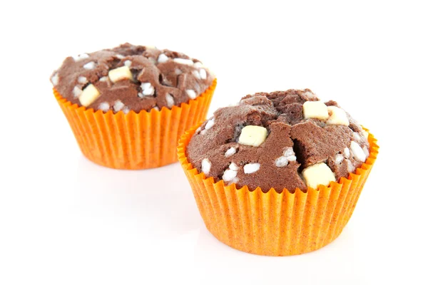 Brown home baked cupcake with chocolate pieces — Stock Photo, Image