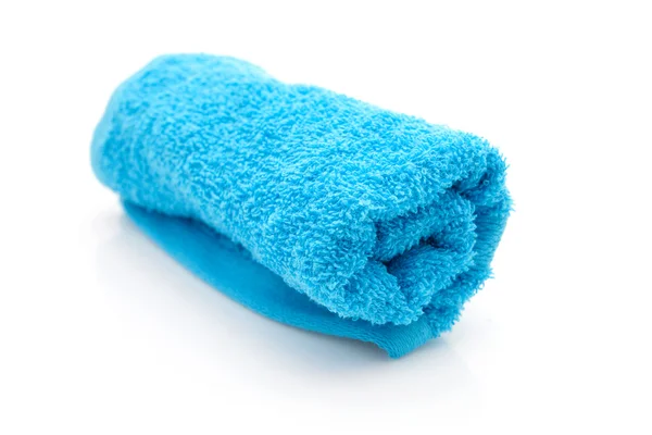 Asciugamano blu arrotolato — Foto Stock