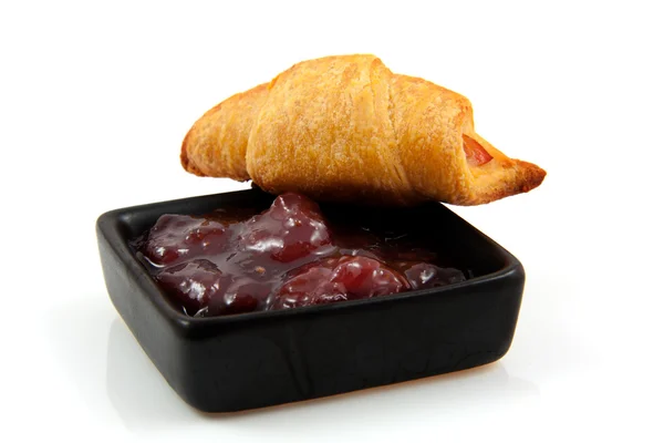 Croissant och marmelad — Stockfoto