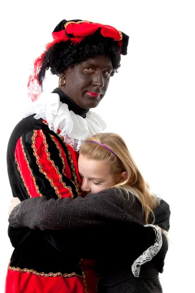 Chica es abrazando negro pete — Foto de Stock