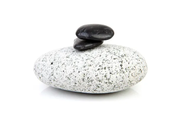 Grosse roche grise avec petits noirs — Photo