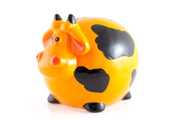 Banco Piggy em forma de vaca laranja — Fotografia de Stock