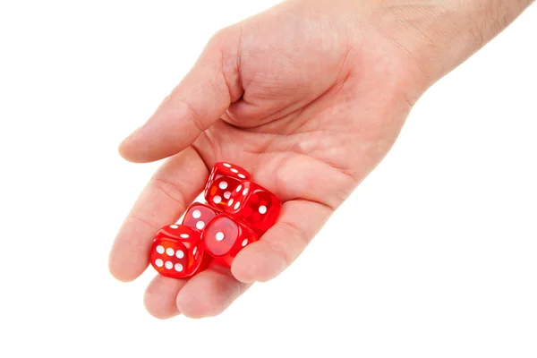 Hand is throwing red dices — Stock Photo, Image