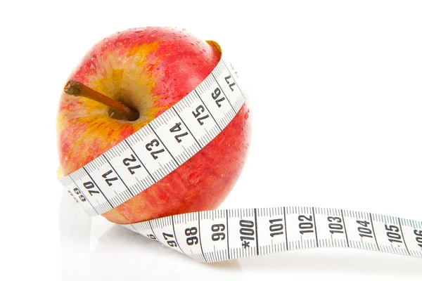 Manzana con cinta métrica para dieta — Foto de Stock
