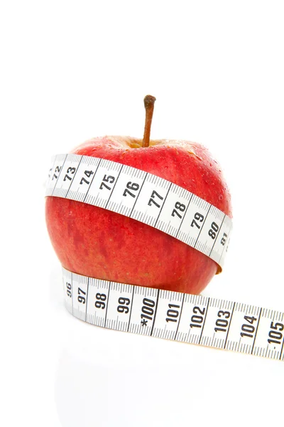 Elma diyeti için ölçü bandı ile — Stok fotoğraf