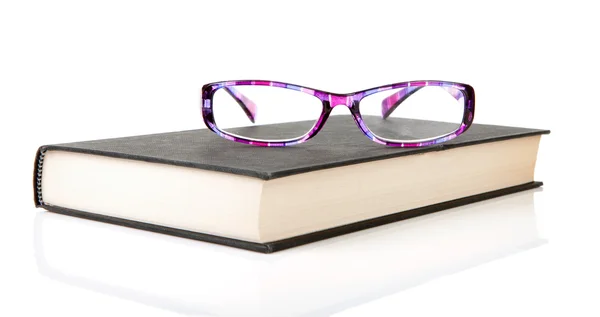 Livro com óculos de leitura — Fotografia de Stock