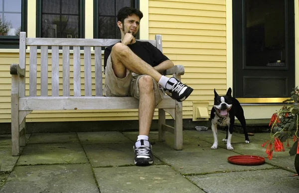 stock image Man With a Playful Dog