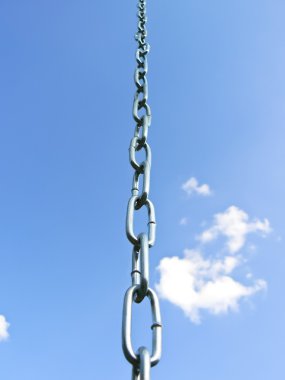 Chain against the backdrop of the sky clipart