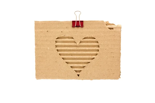Hjärtat på en pappersbit kartong — Stockfoto