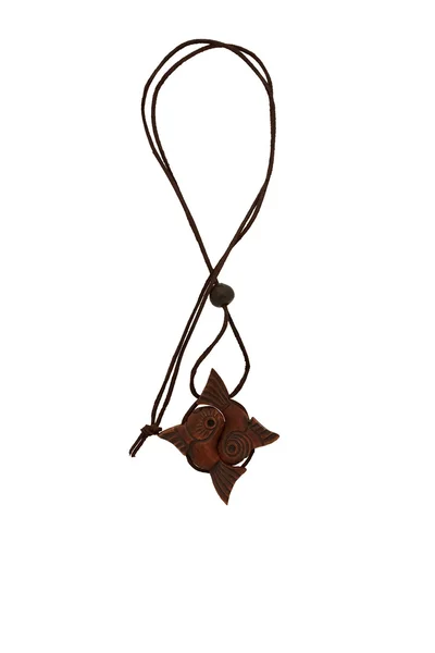 Drewniane amulet w postaci ryby — Zdjęcie stockowe