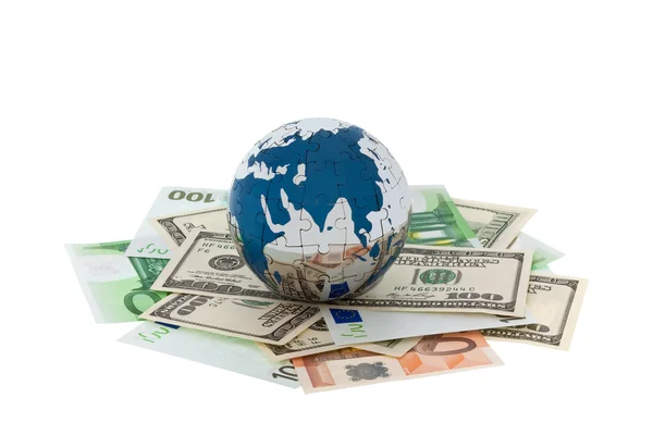 Geld en globe — Stockfoto