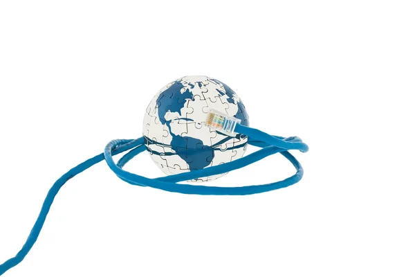 Globus puzzle zwinięty kabel — Zdjęcie stockowe