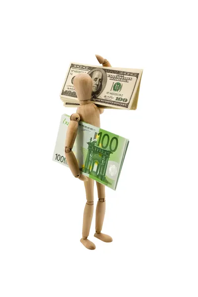 Homem de madeira move o euro e dólares — Fotografia de Stock