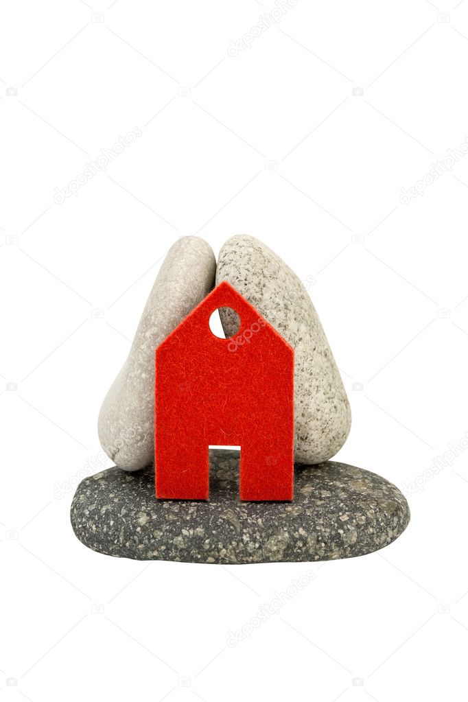 House and stones on a white background