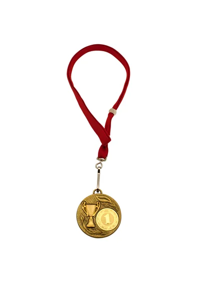 Золотая медаль на белой спине — стоковое фото