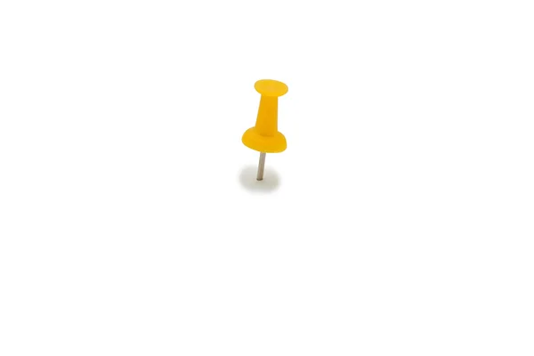 Closeup of yellow drawing pin — Stock Photo, Image
