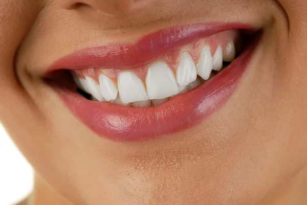 Улыбающаяся женщина рот — стоковое фото